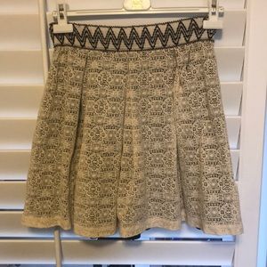 Tan and black print skirt